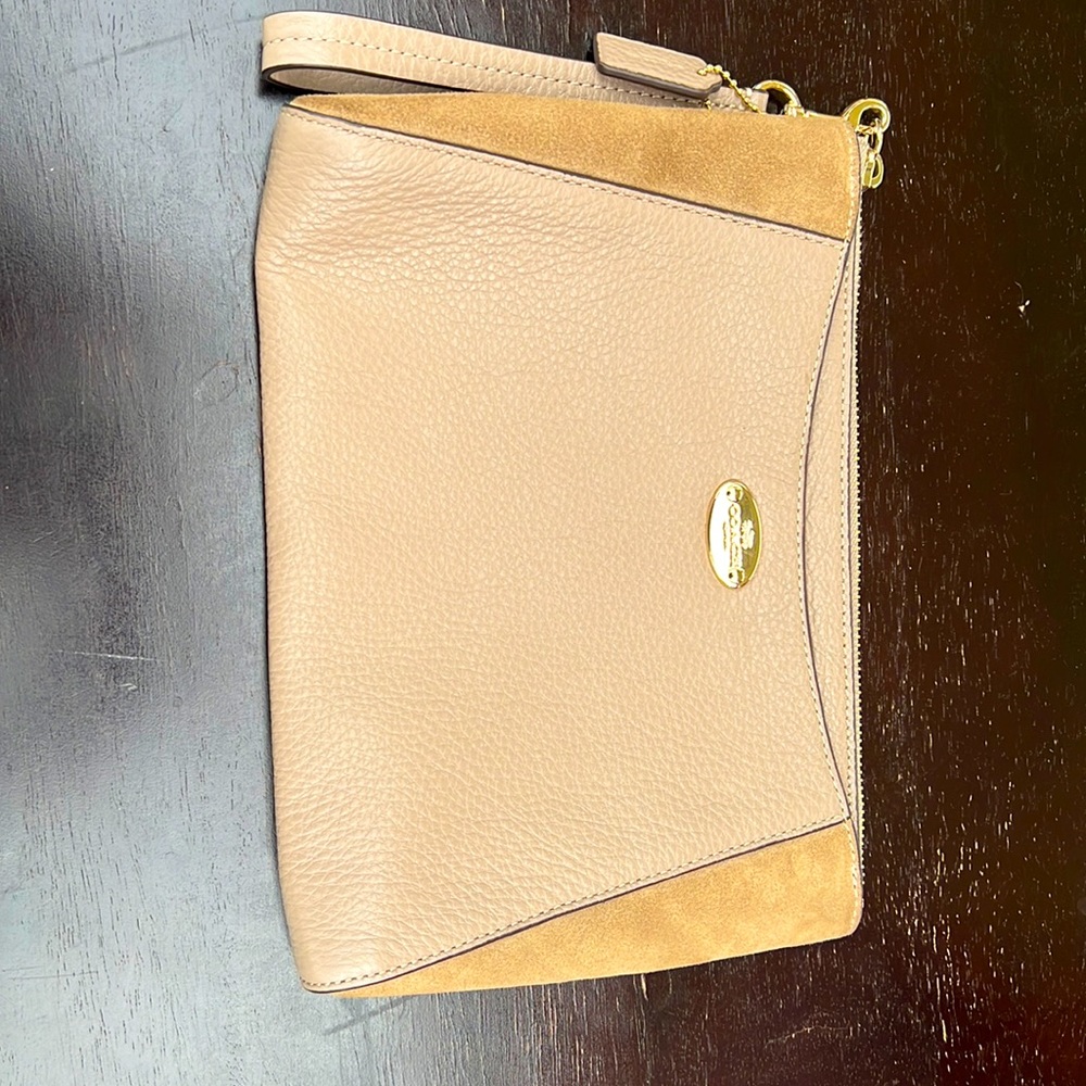 Coach wristlet. Excellent condition. Soft leather smoke-free home.
